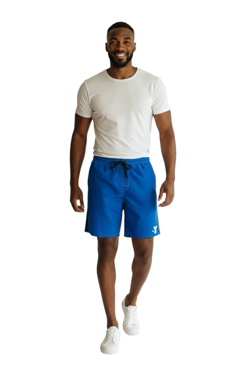 The Lifeguard Store blue polyester YMCA board shorts with black side stripes and white contrast stitching. Features drawstring waist and logo.
