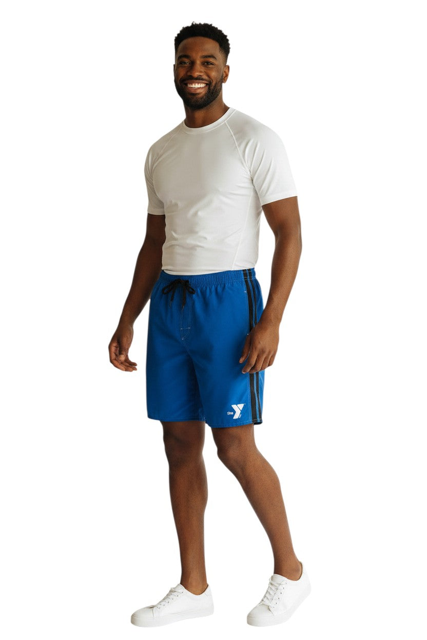 The Lifeguard Store blue polyester YMCA board shorts with black side stripes and white contrast stitching. Elastic waist, drawstring, and logo.