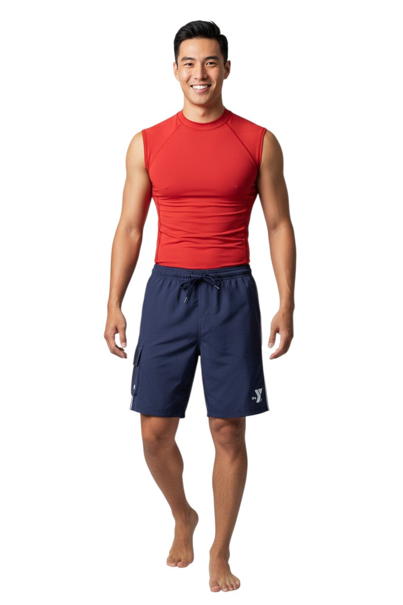The Lifeguard Store navy blue YMCA board shorts with elastic waistband, drawstring, and cargo pocket. 7" inseam.