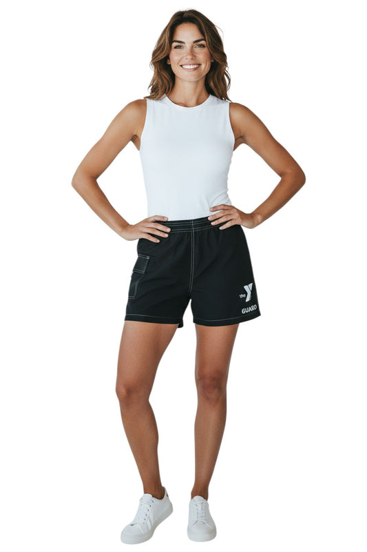 The Lifeguard Store YMCA Guard black polyester-spandex board shorts with elastic waistband and side pocket.