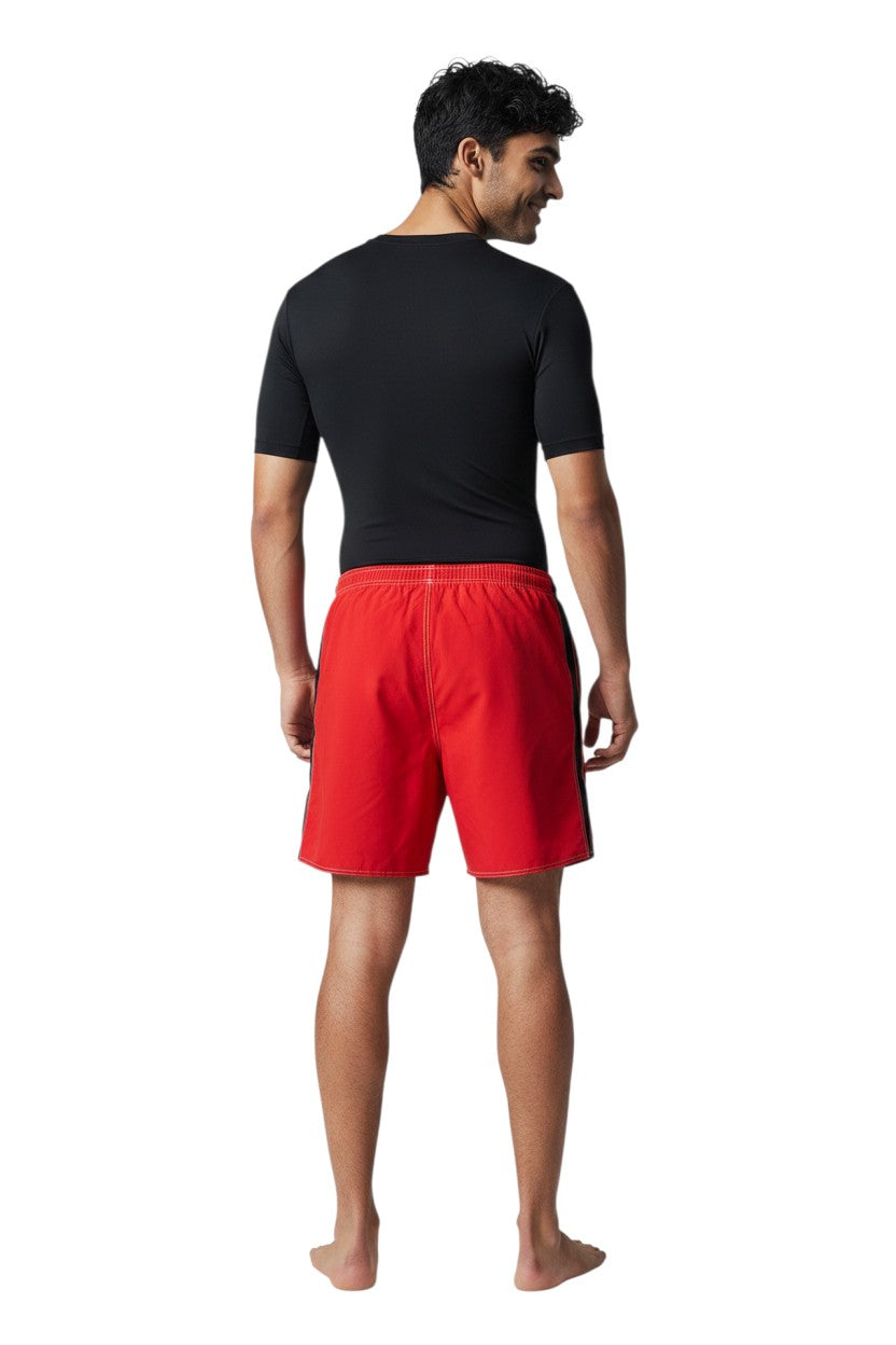 The Lifeguard Store YMCA Guard red polyester board shorts with black side stripe and white drawstring.