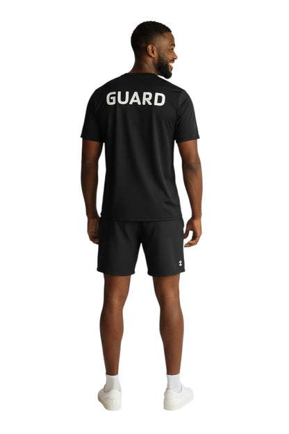 The Lifeguard Store YMCA Guard Short Sleeve Rashguard in black, made of polyester and spandex with UPF50+ protection.