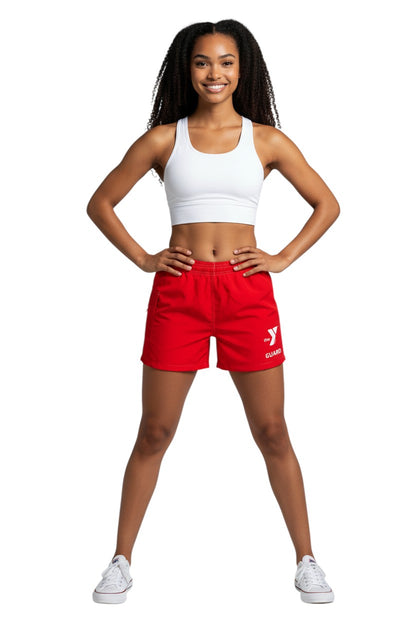 The Lifeguard Store YMCA Guard red polyester-spandex board shorts with elastic waistband and side pocket.