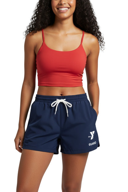 The Lifeguard Store navy blue polyester YMCA Guard Roll shorts with white drawstring and logo. Quick-dry fabric.