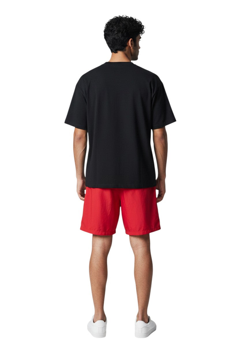 The Lifeguard Store YMCA Instructor Boardshort in red polyester with elastic waistband and drawstring. Features 7" inseam.