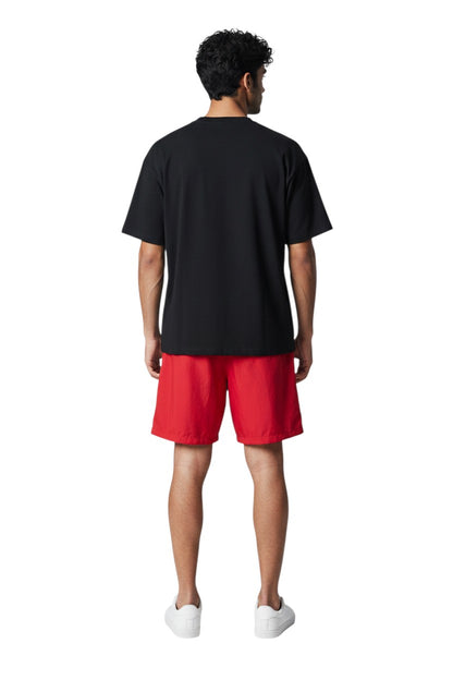 The Lifeguard Store YMCA Instructor Boardshort in red polyester with elastic waistband and drawstring. Features 7" inseam.