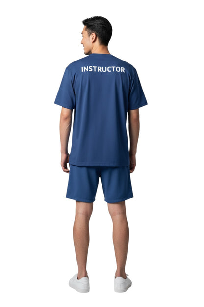 The Lifeguard Store YMCA Instructor Dri-Fit Tee in blue polyester with "INSTRUCTOR" screened on the back.