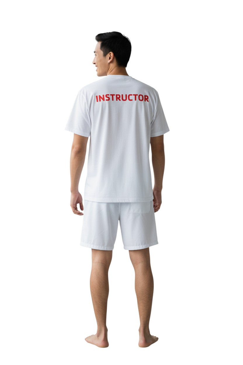 The Lifeguard Store white 100% polyester Dri-Fit tee with red "INSTRUCTOR" screened on the upper back.