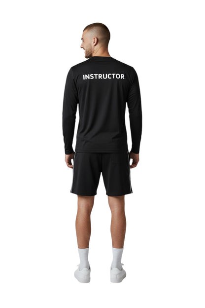 The Lifeguard Store YMCA Kiefer Instructor long sleeve rashguard in black, made of polyester and spandex blend with UPF50+ protection.