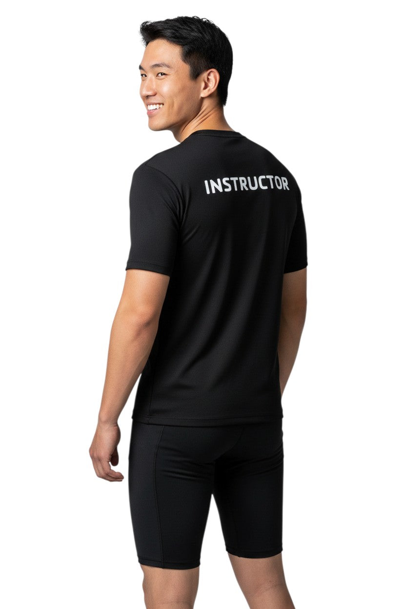 The Lifeguard Store YMCA Kiefer Instructor black short-sleeve rashguard made of polyester and spandex with UPF50+ protection.
