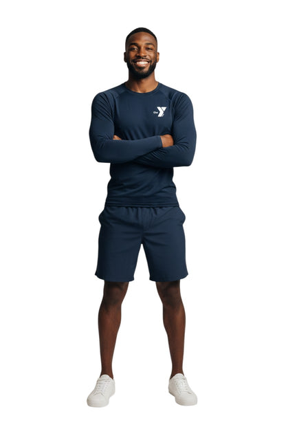 The Lifeguard Store YMCA Kiefer long sleeve navy blue rashguard with UPF 50+ protection, made of polyester and spandex.