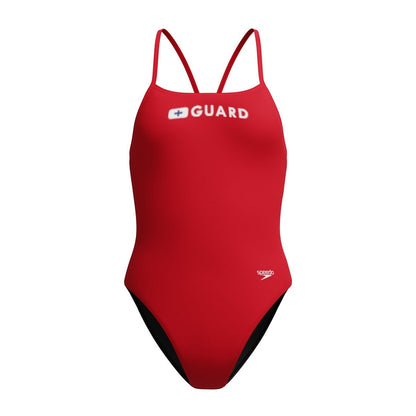 The Lifeguard Store Speedo red one-piece swimsuit with "GUARD" text and a red cross logo on the chest.