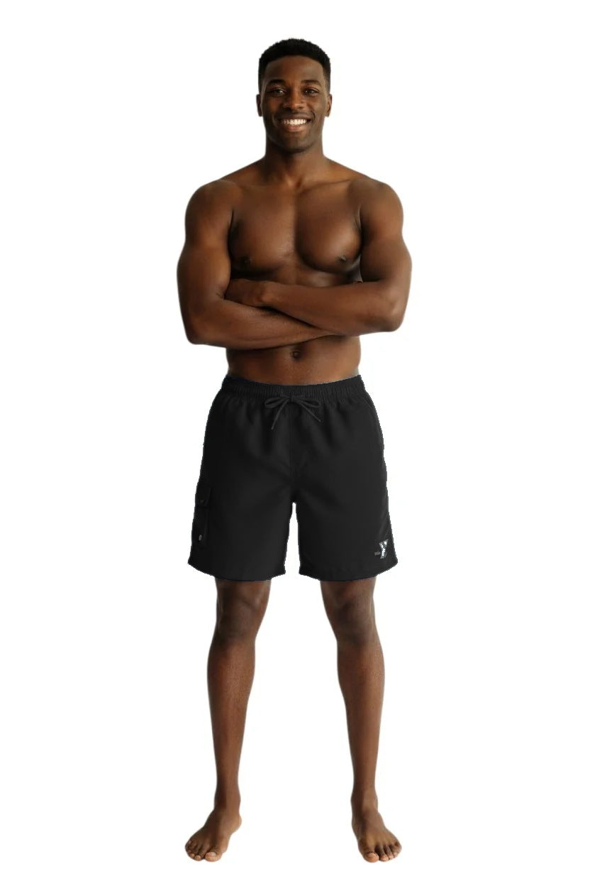 YMCA Men's Kiefer Board Short in black, front view on model with white Y logo on the left leg